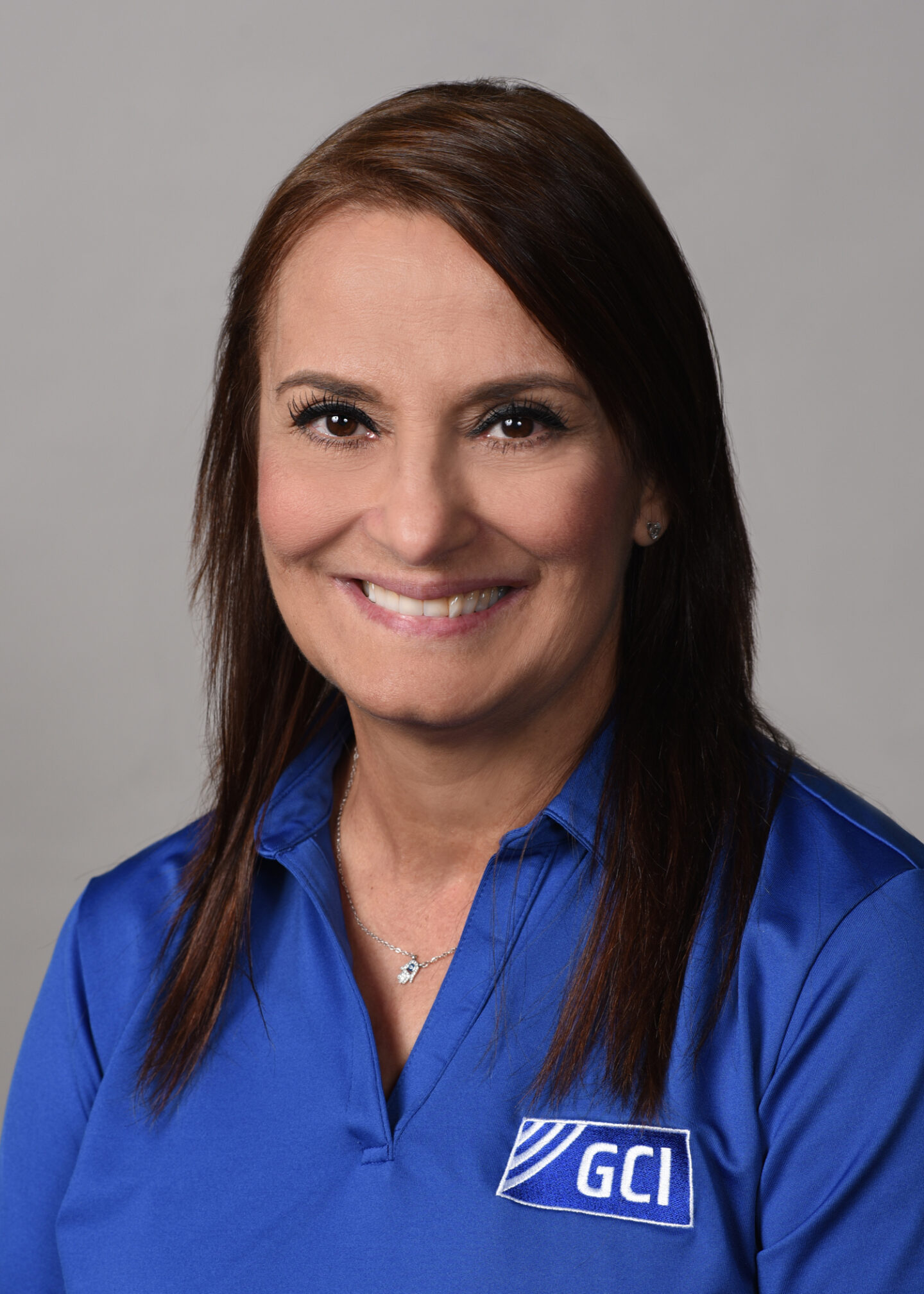 Professional headshot of Margarita Ricks, Operations Coordinator at GCI Consultants, smiling confidently in GCI business attire.