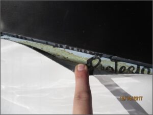 Example of roof flashing that is not properly counter-flashed below the skylight curb, highlighting one common cause of water intrusion through skylights.